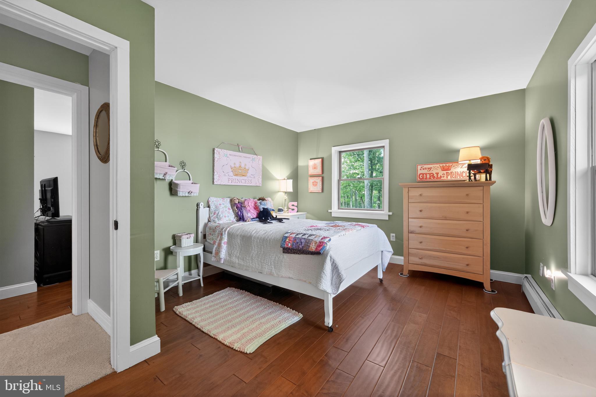 460 Wells Road Doylestown, PA 18901 - Photo 23 of 65 Charming green-hued bedroom retreat.
