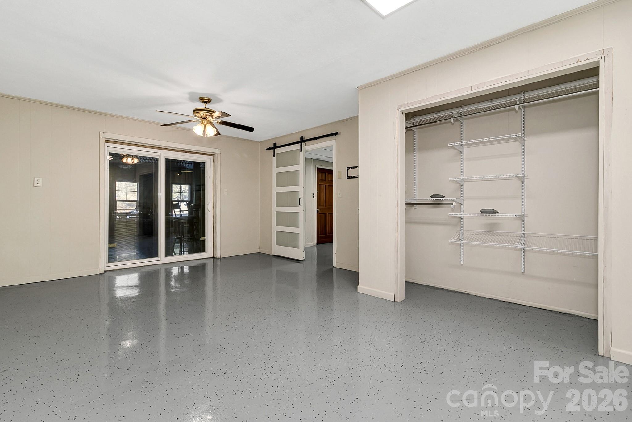 44 Tuttle Road Hendersonville, NC 28792 - Photo 26 of 37 wooden floor and window in an empty room