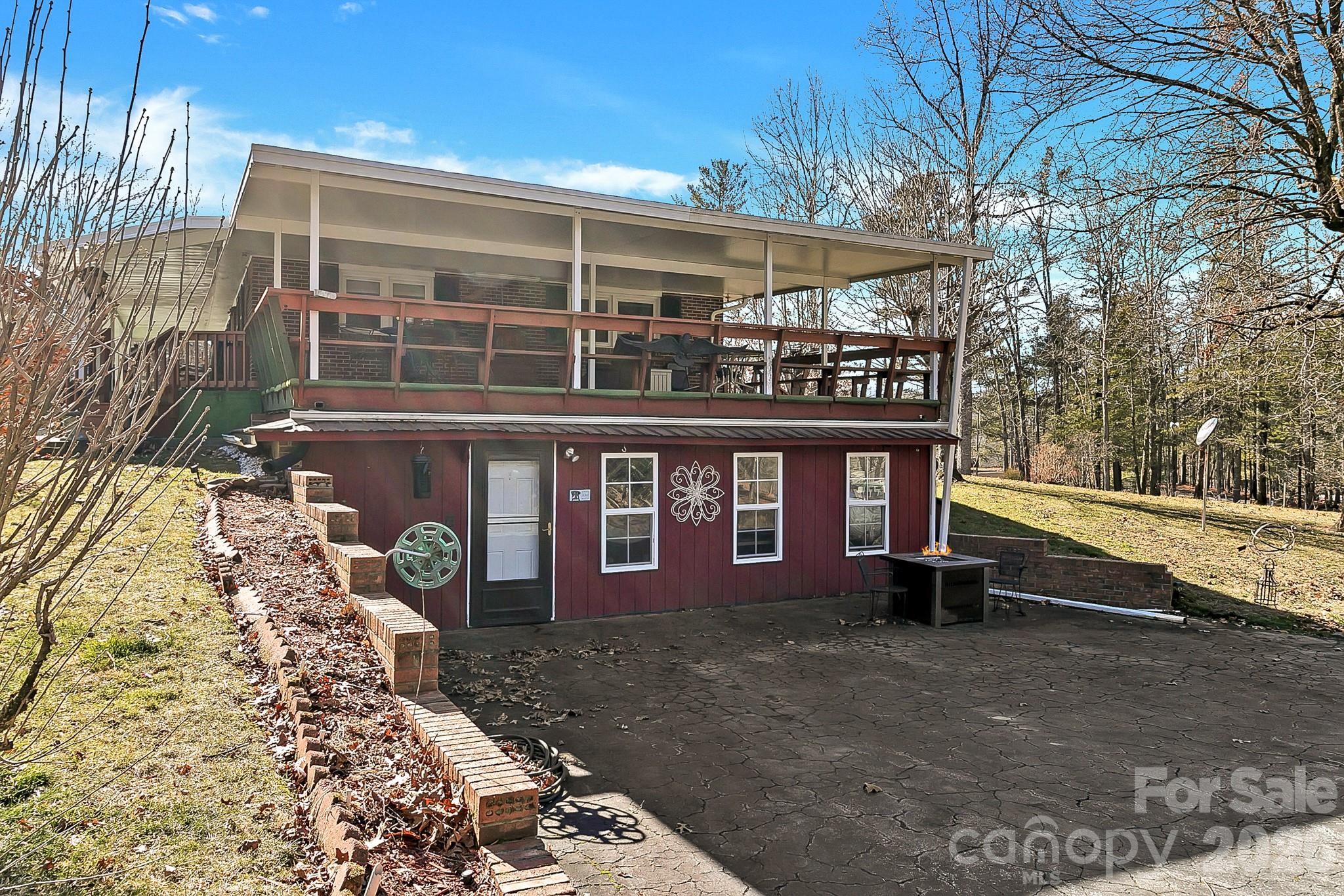 44 Tuttle Road Hendersonville, NC 28792 - Photo 6 of 37 a front view of a house with a yard