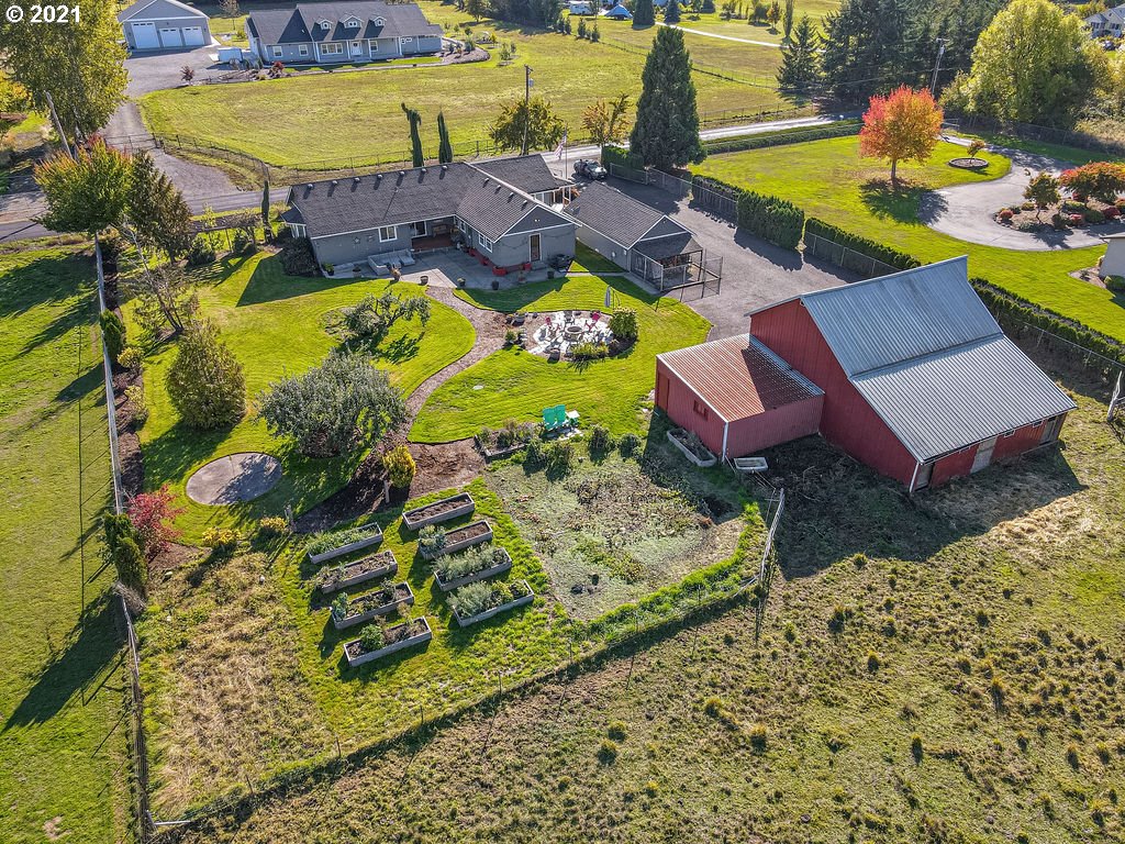 320 Northwest 194th Street Ridgefield, WA 98642 - Photo 5 of 32 an aerial view of a house with a swimming pool