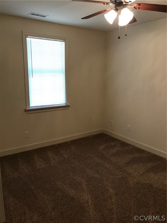 8855 Strath Road Henrico, VA 23231 - Photo 19 of 23 an empty room with a window