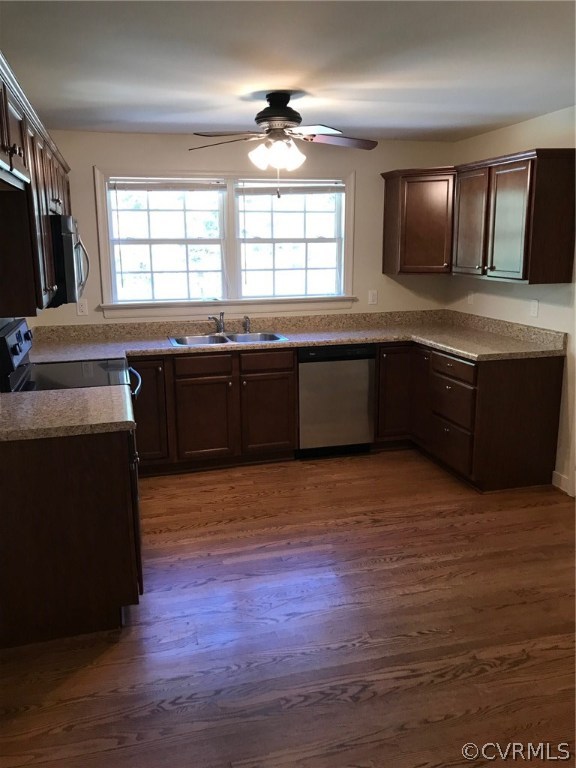 8855 Strath Road Henrico, VA 23231 - Photo 2 of 23 a large kitchen with stainless steel appliances granite countertop a stove a sink dishwasher and wooden floor