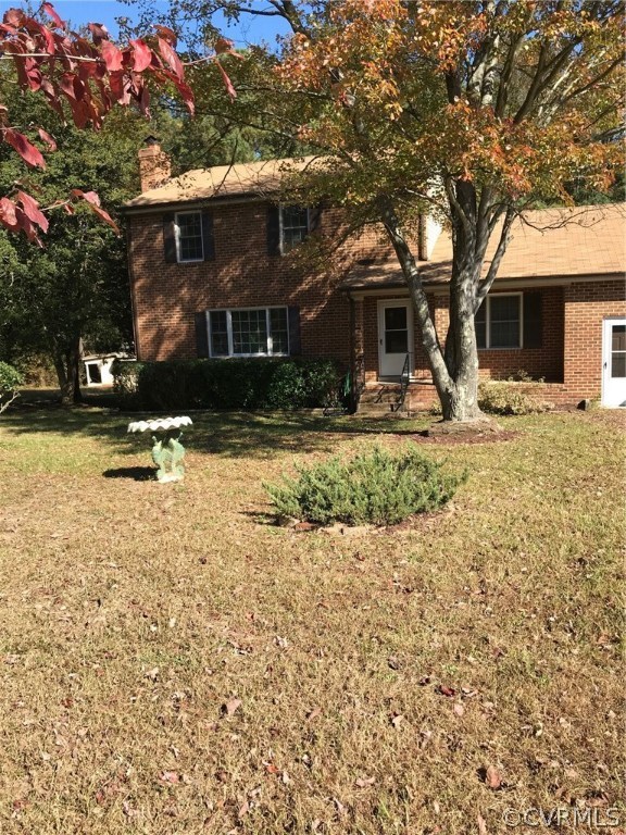 8855 Strath Road Henrico, VA 23231 - Photo 23 of 23 a view of a house with a yard