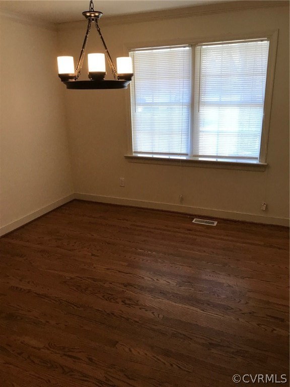 8855 Strath Road Henrico, VA 23231 - Photo 5 of 23 an empty room with wooden floor and windows