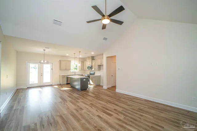 a view of an empty room and window