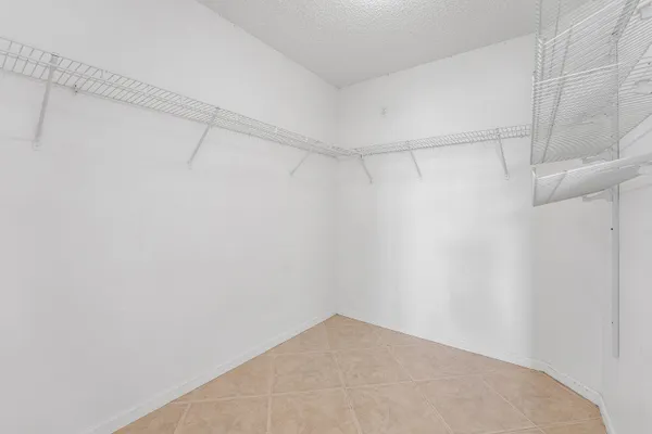 a view of a room with racks on the wall