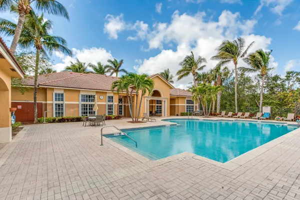 a view of a house with swimming pool