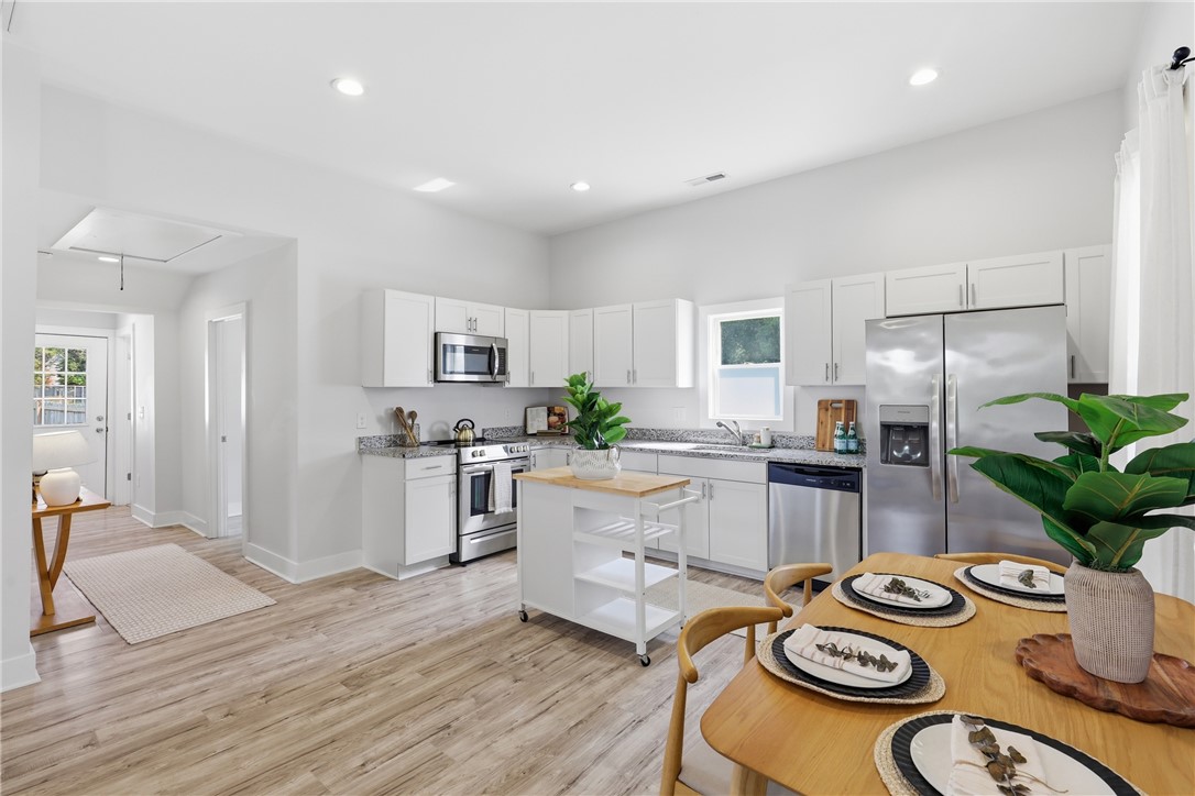 1 Brock Street Pelzer, SC 29669 - Photo 11 of 25 Culinary creations come to life in this kitchen, featuring stainless steel appliances and abundant counter space.