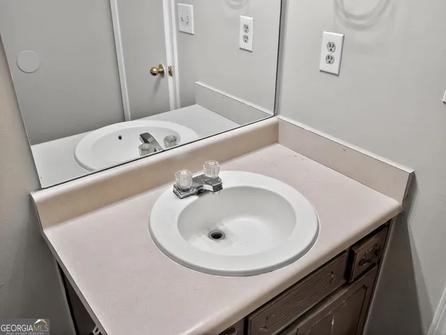 a bathroom with a sink and a toilet