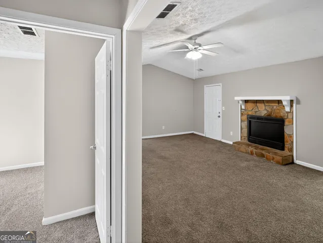 a view of livingroom with workspace