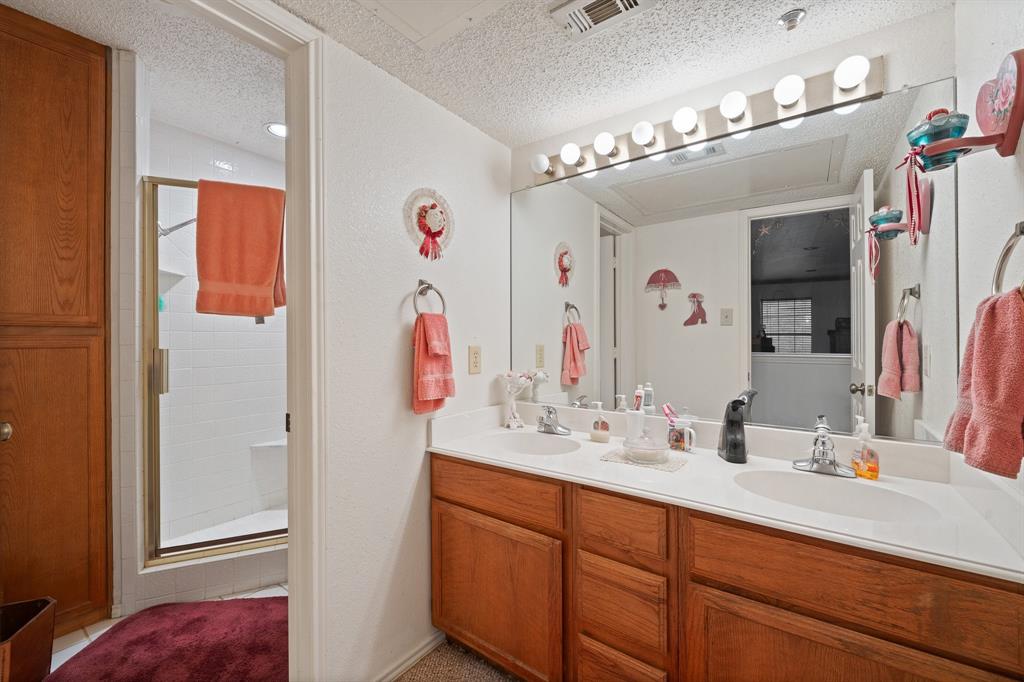 3500 Trails End Road Burleson, TX 76028 - Photo 15 of 24 a bathroom with a double vanity sink and a mirror