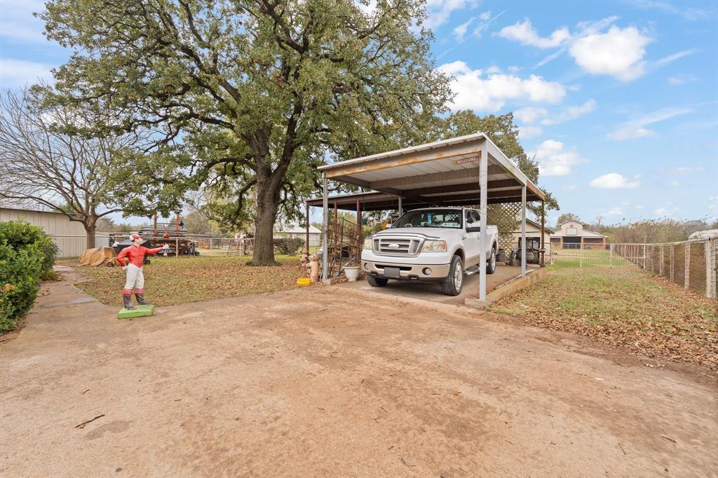 3500 Trails End Road Burleson, TX 76028 - Photo 18 of 24 a white house covered with tall trees