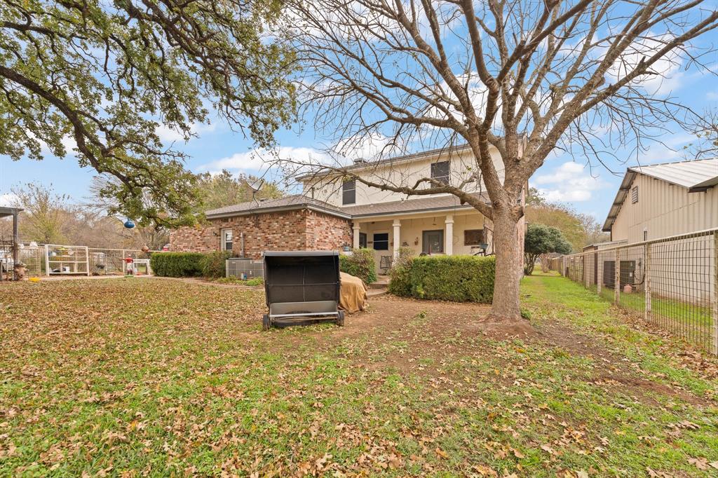 3500 Trails End Road Burleson, TX 76028 - Photo 19 of 24 front view of a house with a yard