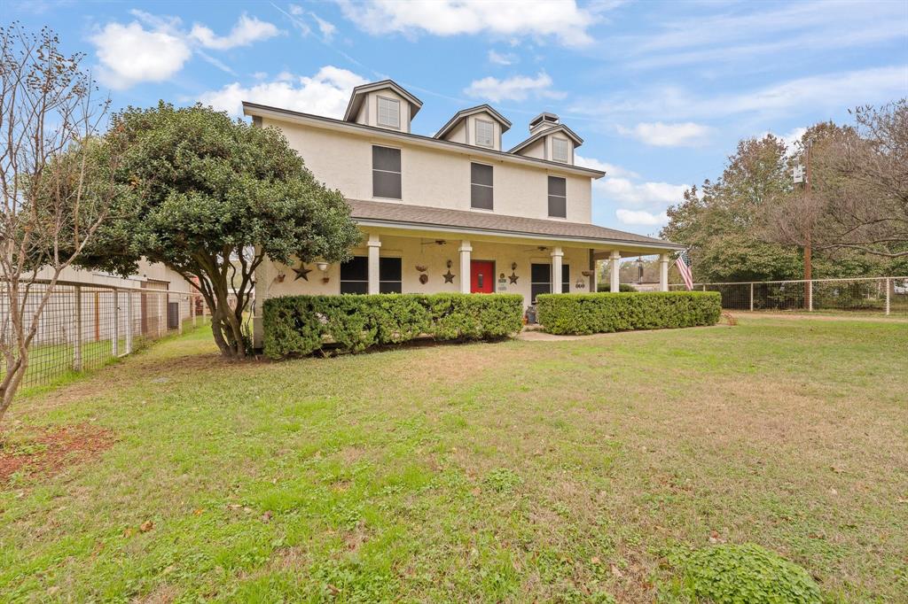 3500 Trails End Road Burleson, TX 76028 - Photo 2 of 24 a front view of a house with a yard