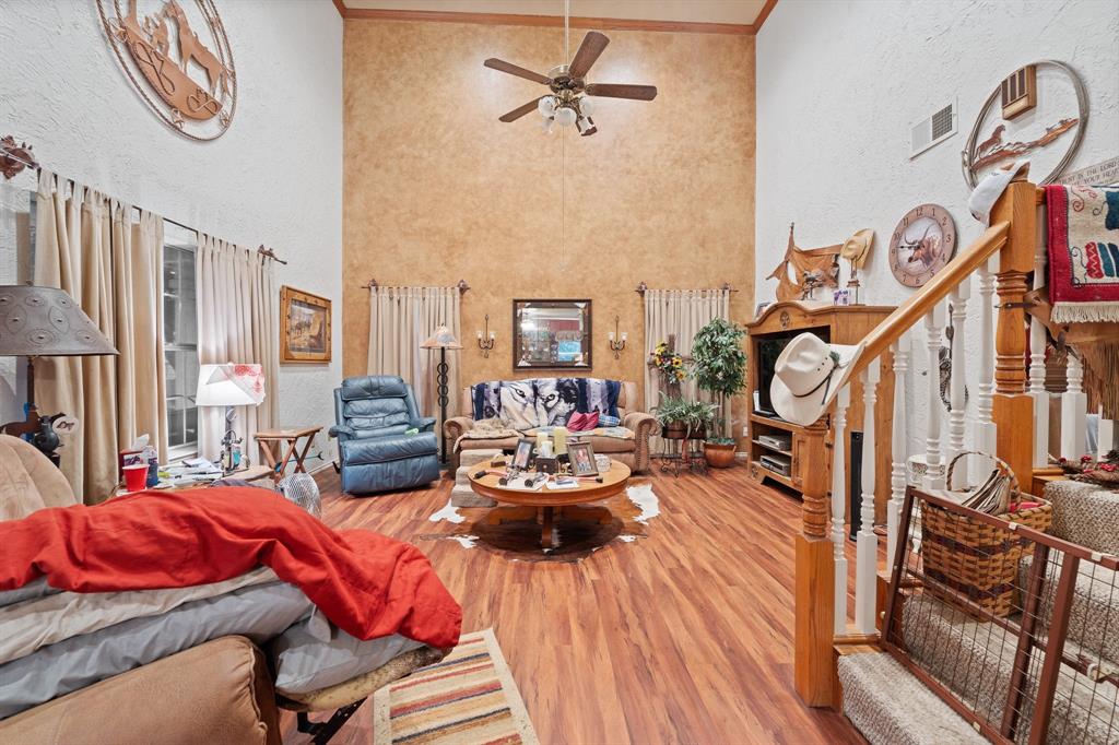 3500 Trails End Road Burleson, TX 76028 - Photo 5 of 24 a view of a livingroom with furniture and a flat screen tv