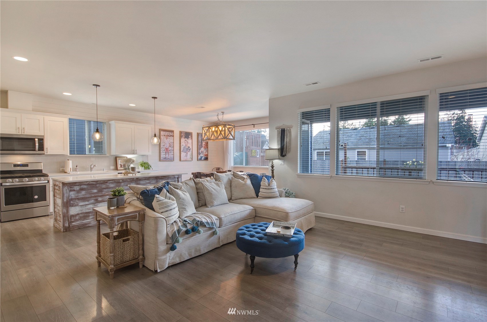 20206 18th Ave Court East Spanaway, WA 98387 - Photo 11 of 37 a living room with furniture and a large window