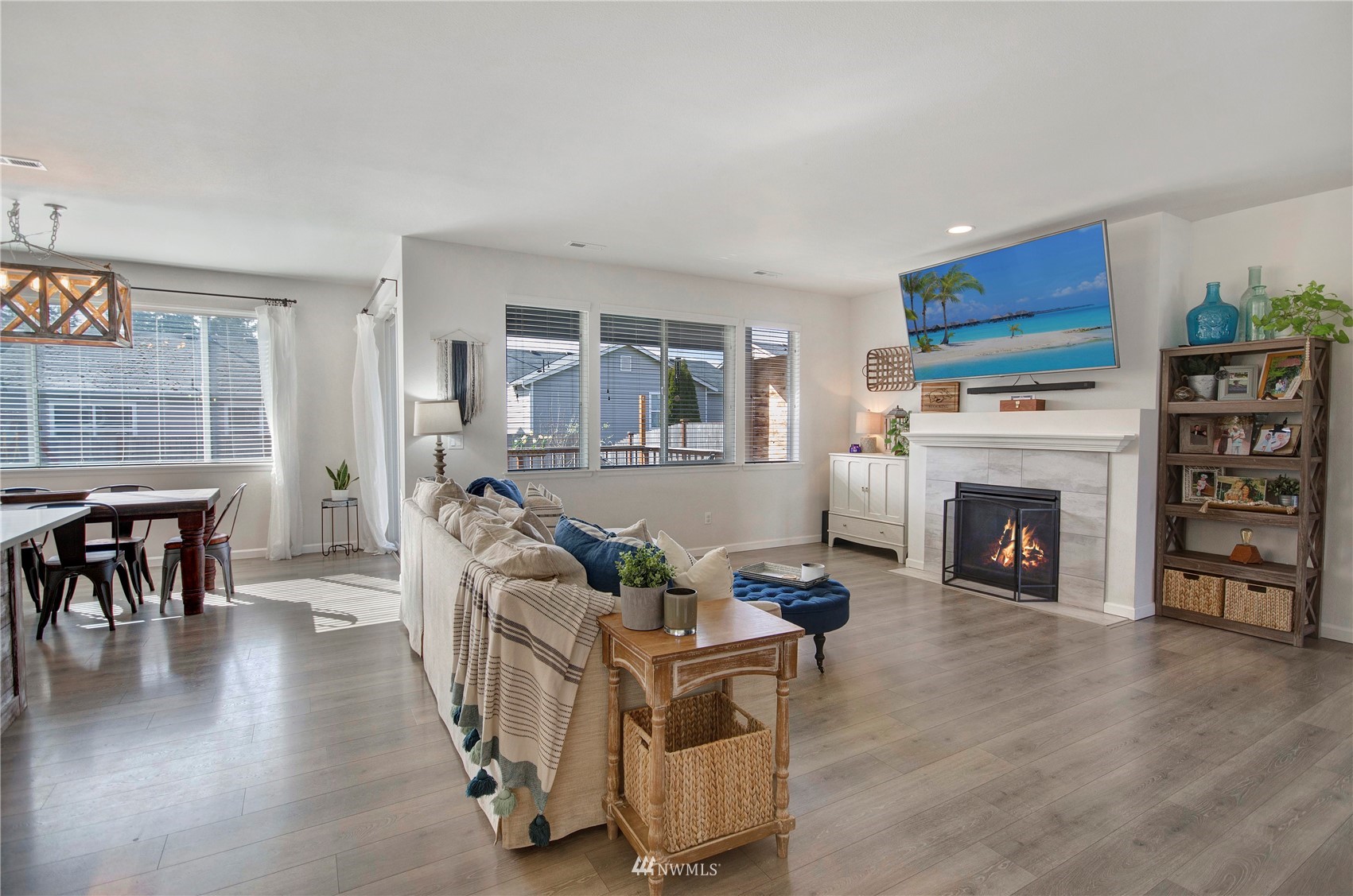 20206 18th Ave Court East Spanaway, WA 98387 - Photo 13 of 37 a living room with furniture and a fireplace