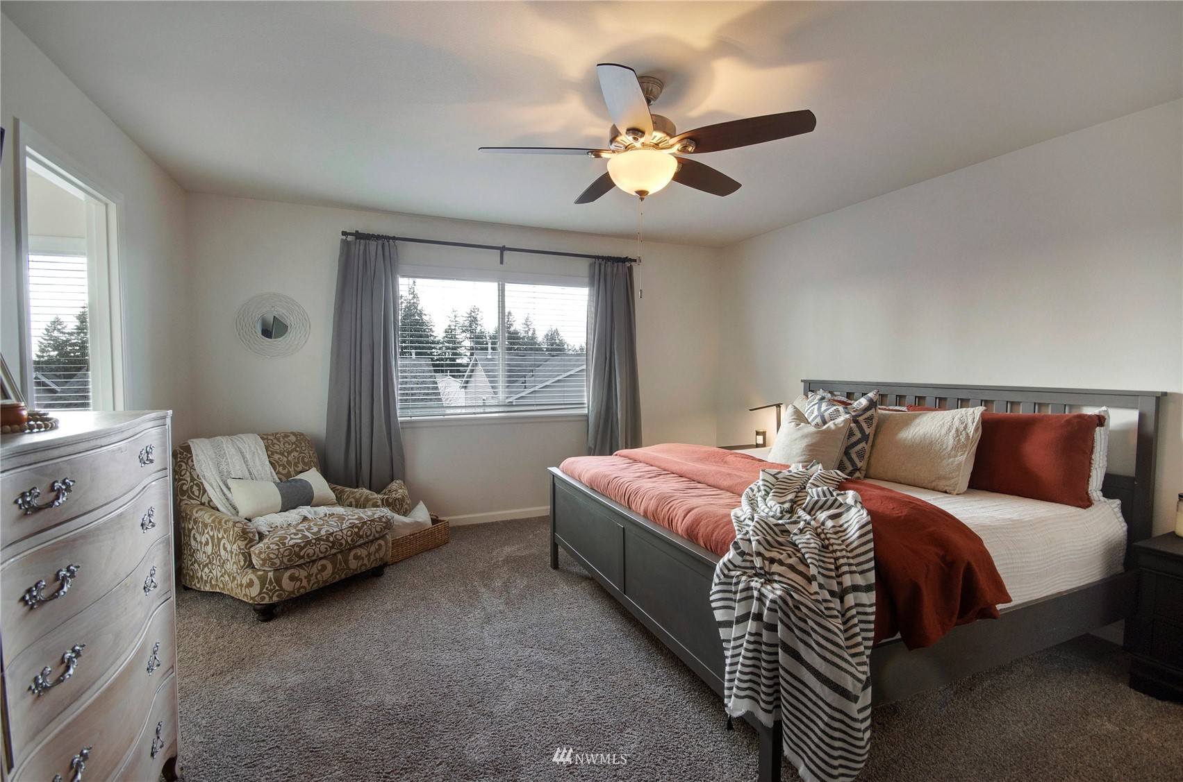 20206 18th Ave Court East Spanaway, WA 98387 - Photo 18 of 37 a bedroom with a bed and window
