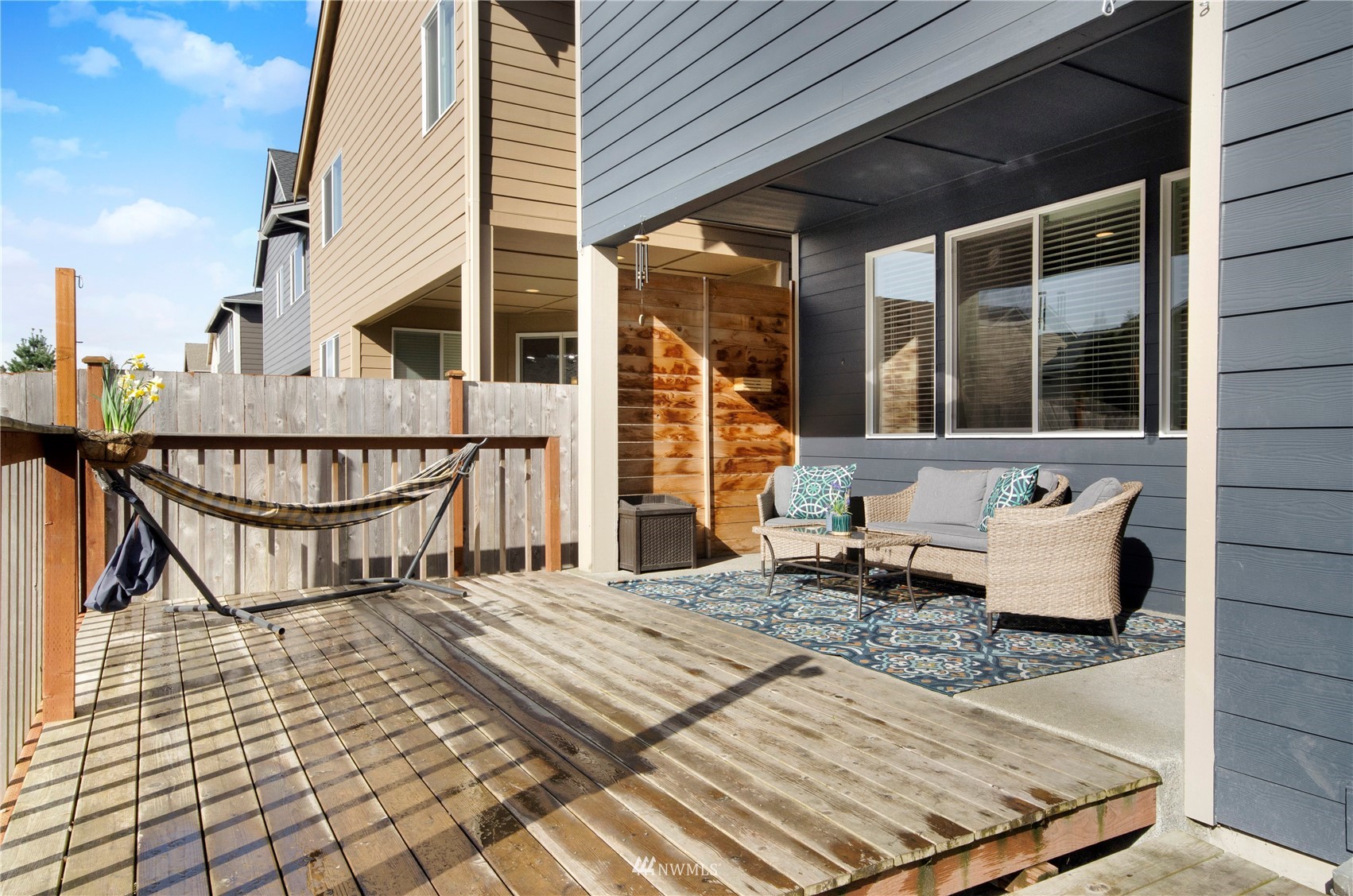 20206 18th Ave Court East Spanaway, WA 98387 - Photo 33 of 37 a bench is sitting in front of house