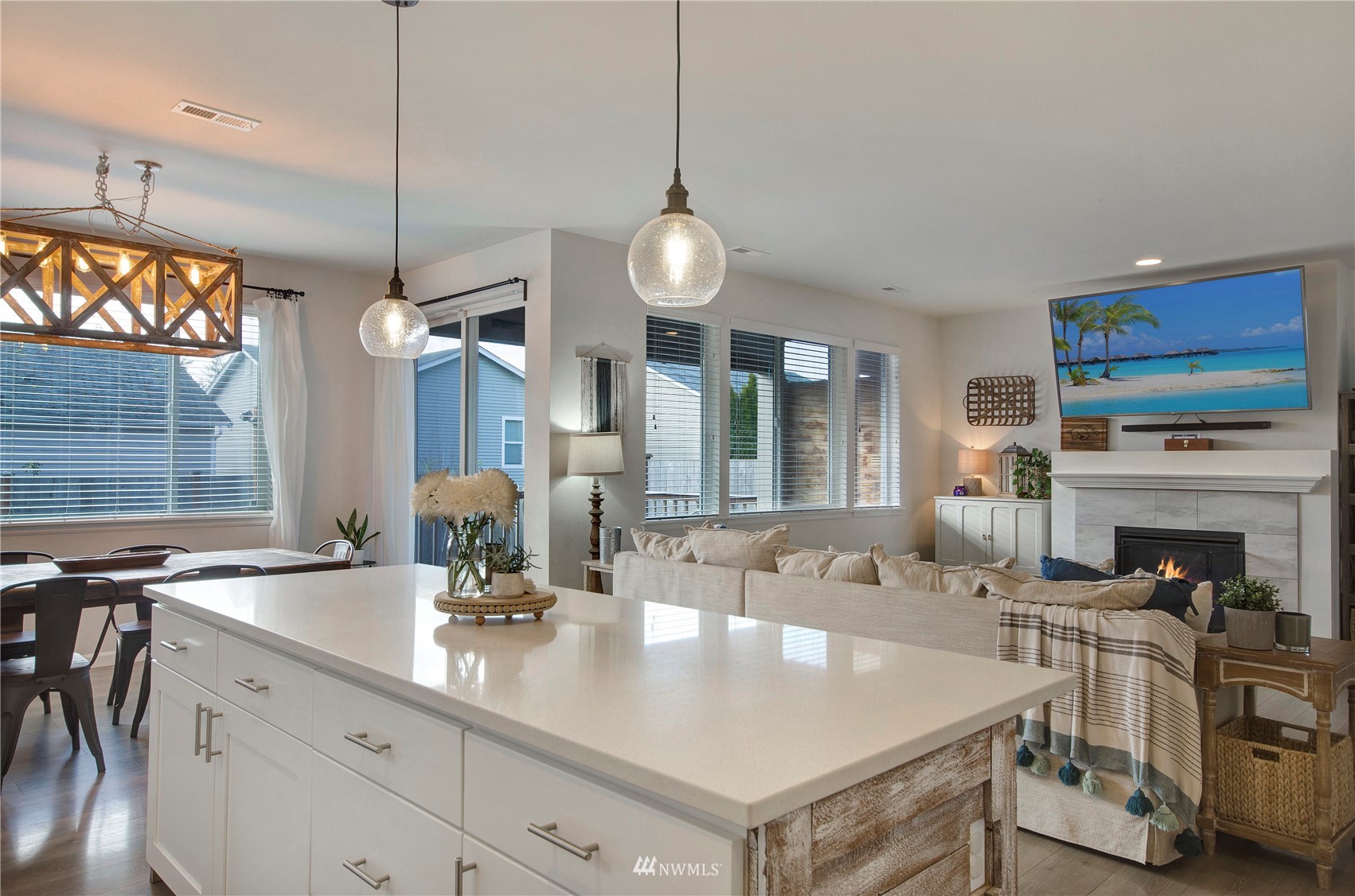 20206 18th Ave Court East Spanaway, WA 98387 - Photo 8 of 37 a view of a kitchen center island and stainless steel appliances