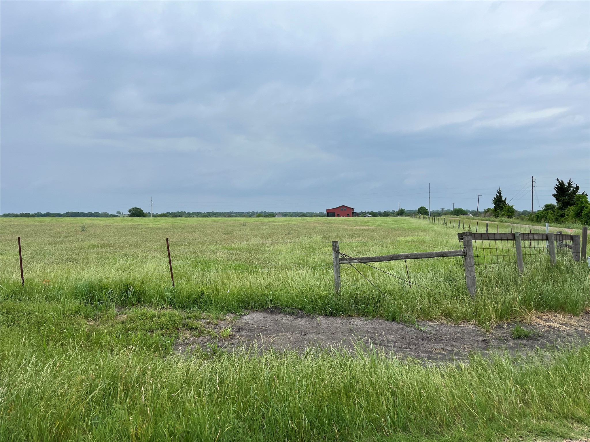 a view of a lake with a yard