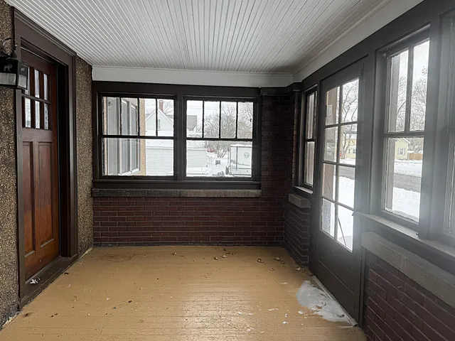 an empty room with windows