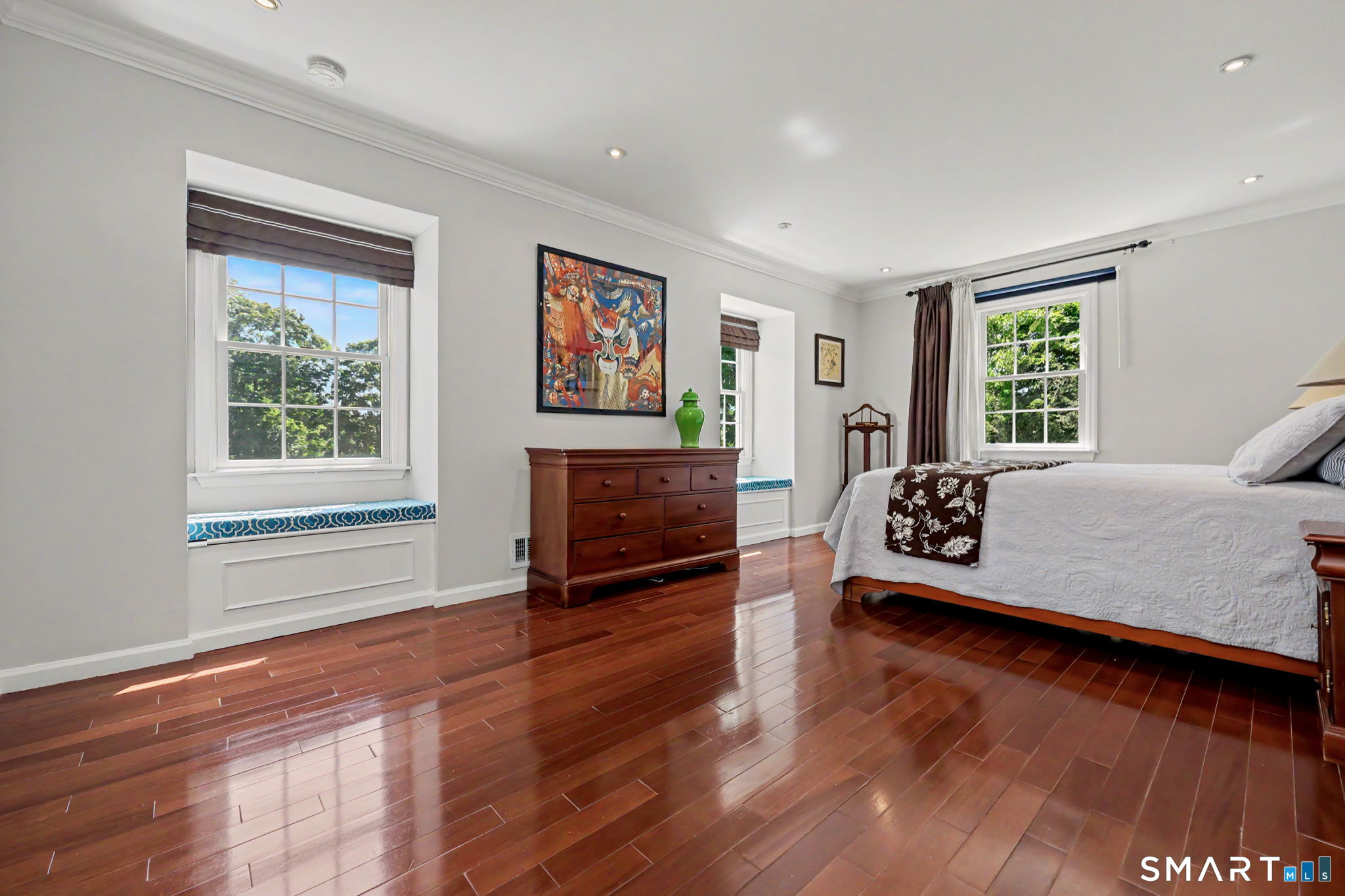1100 Stillwater Road Stamford, CT 06902 - Photo 20 of 40 Generous Primary Bedroom with charming window seats with storage