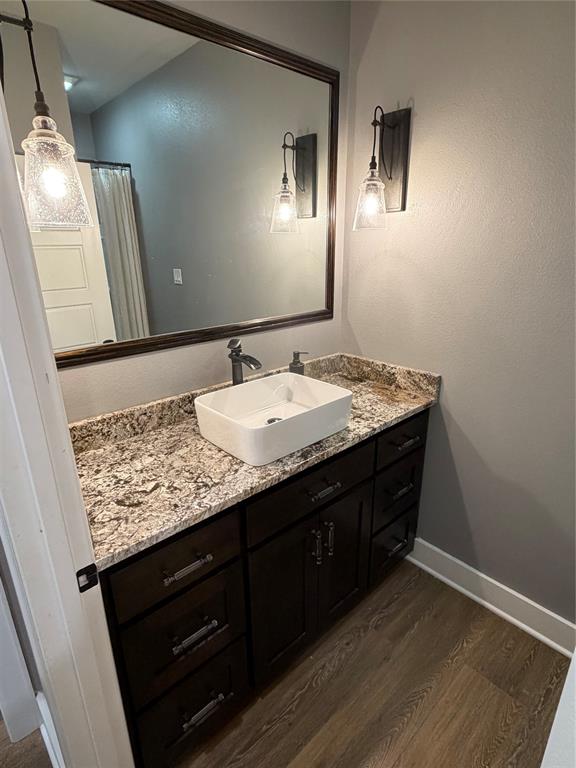 224 Pr 5294 Yantis, TX 75497 - Photo 23 of 35 a bathroom with a granite countertop sink and a mirror