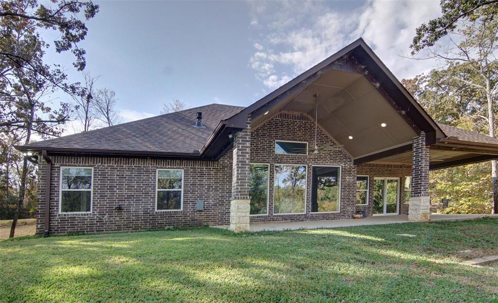 224 Pr 5294 Yantis, TX 75497 - Photo 27 of 35 a view of a house with a yard and porch