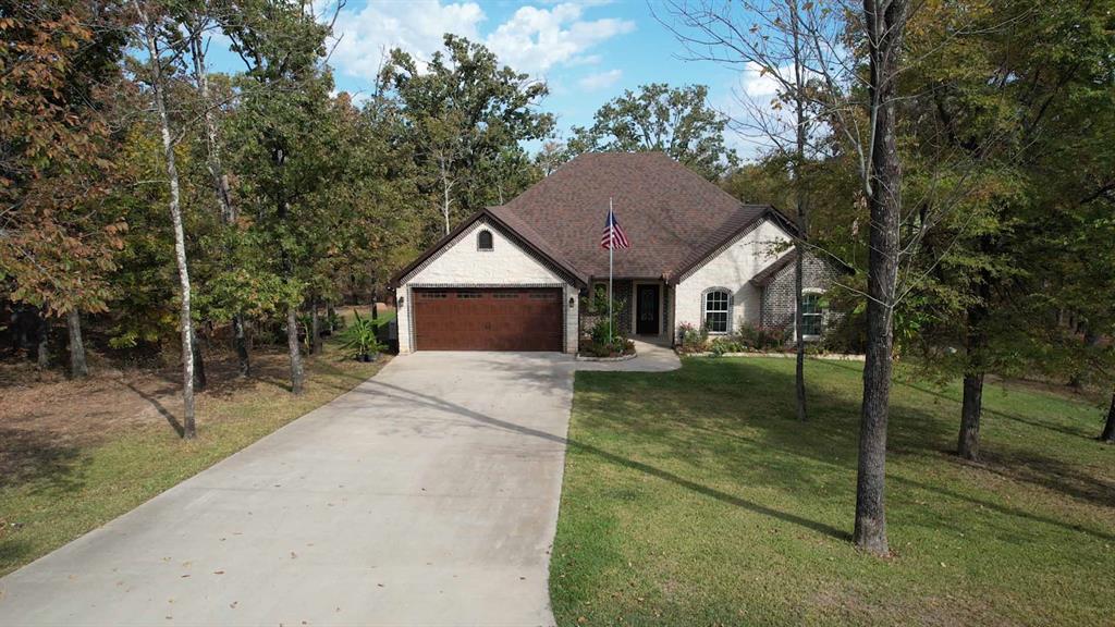 224 Pr 5294 Yantis, TX 75497 - Photo 31 of 35 a front view of a house with garden
