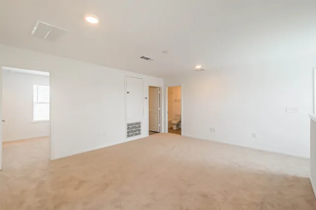 an empty room with an entryway
