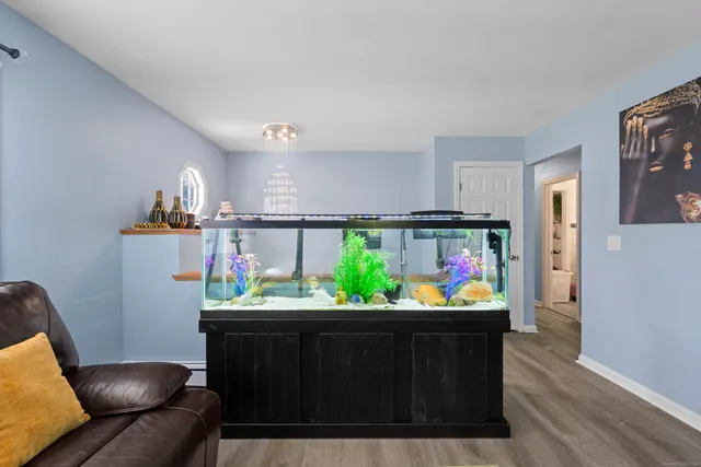 a bedroom with a bed and a couch