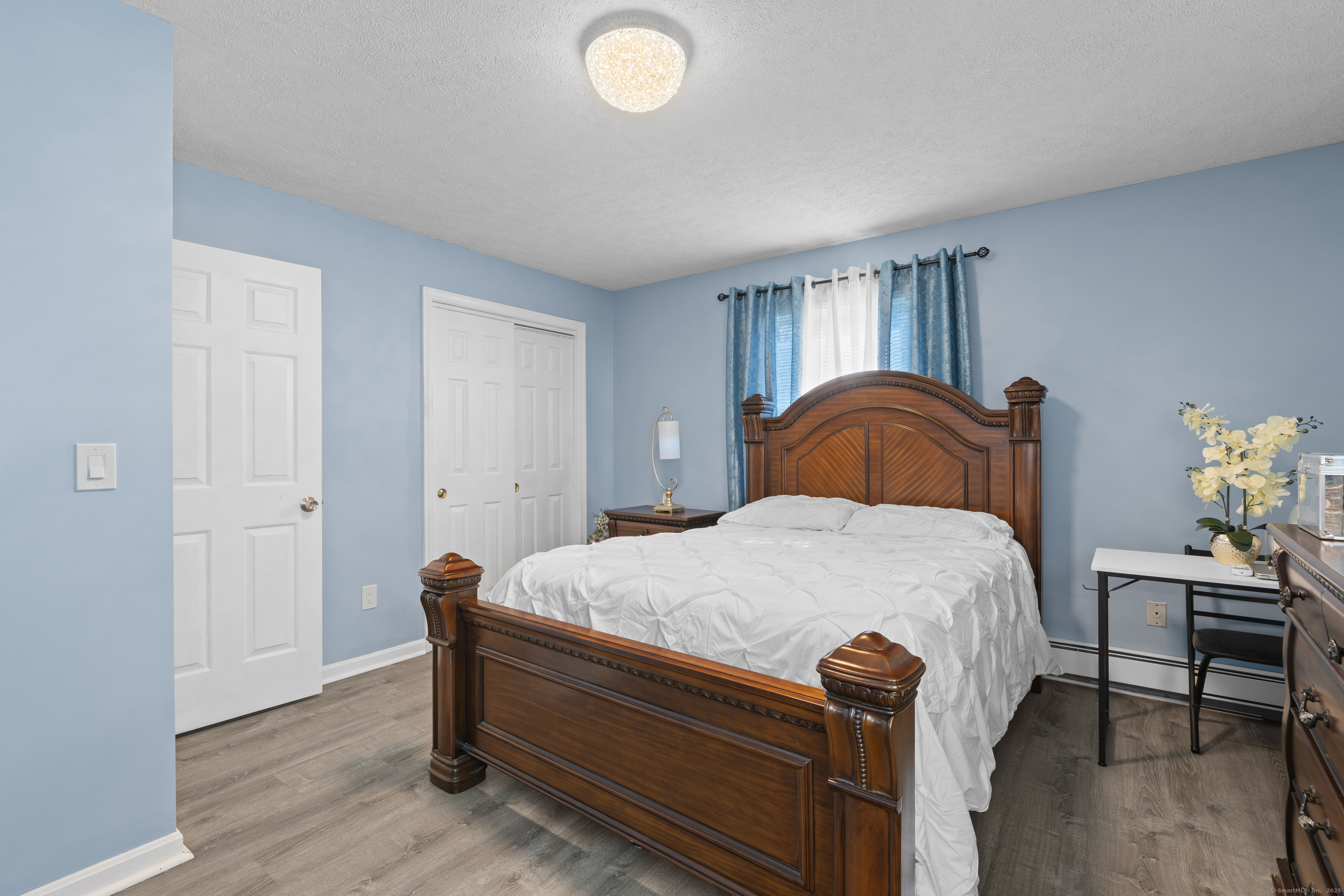 63 Johl Drive Groton, CT 06340 - Photo 20 of 40 a bedroom with a bed and a closet