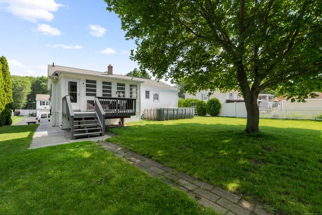 a view of a living room and dining room