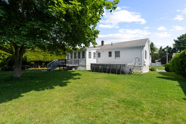 a close view of a sink and cabinets