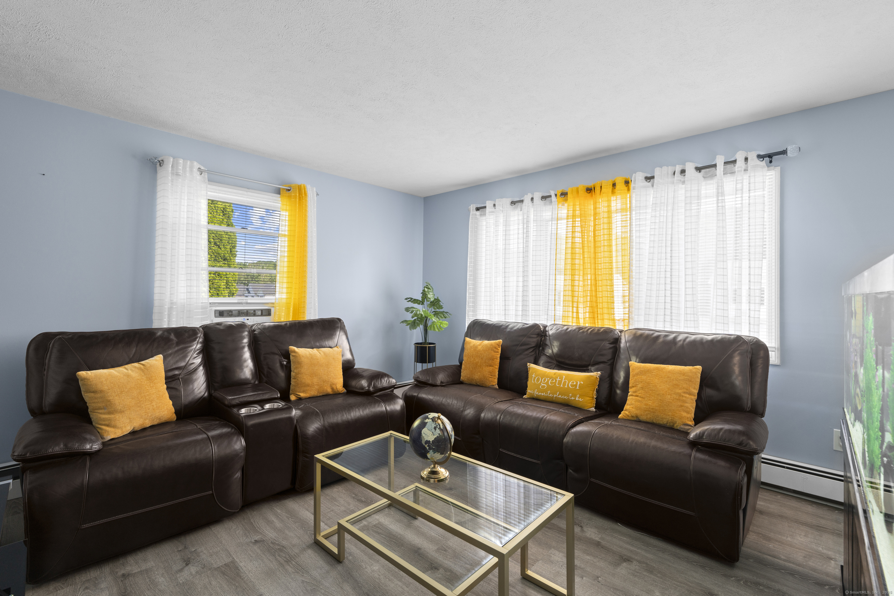 63 Johl Drive Groton, CT 06340 - Photo 10 of 40 a living room with furniture and a window