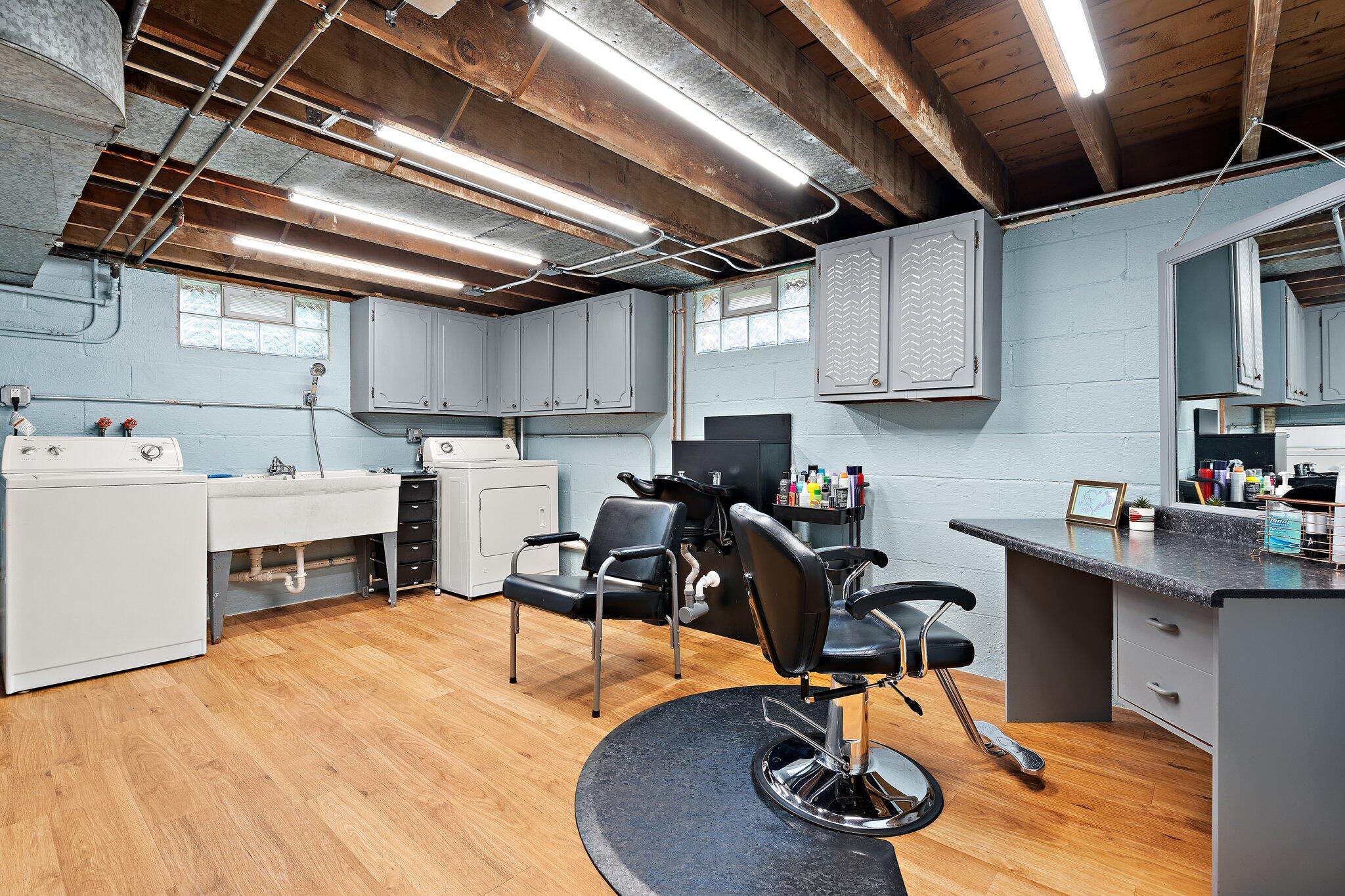 8014 Harrison Avenue Munster, IN 46321 - Photo 26 of 37 a gym room with stainless steel appliances lots of wooden furniture