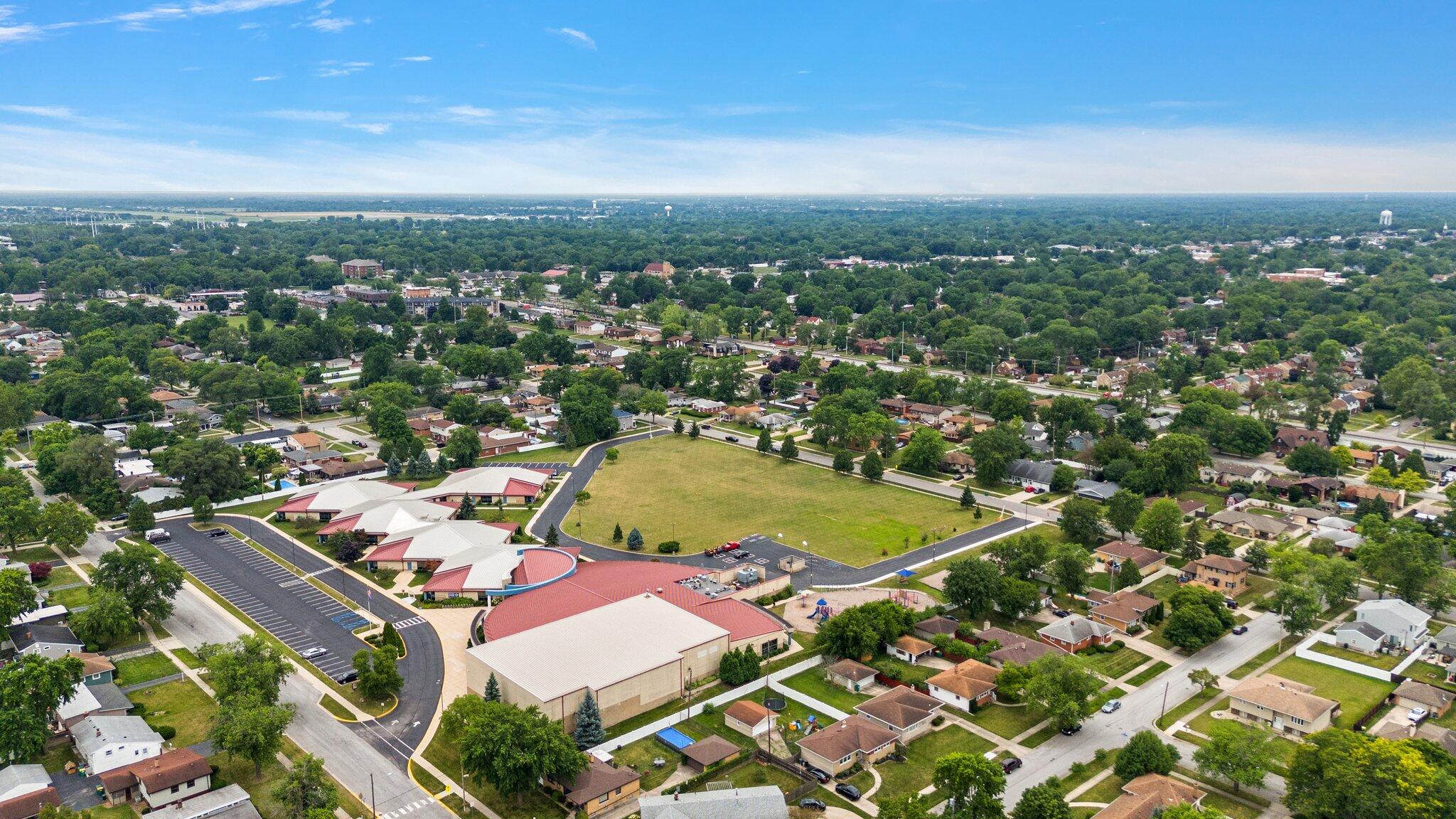 8014 Harrison Avenue Munster, IN 46321 - Photo 34 of 37 an aerial view of residential houses with outdoor space