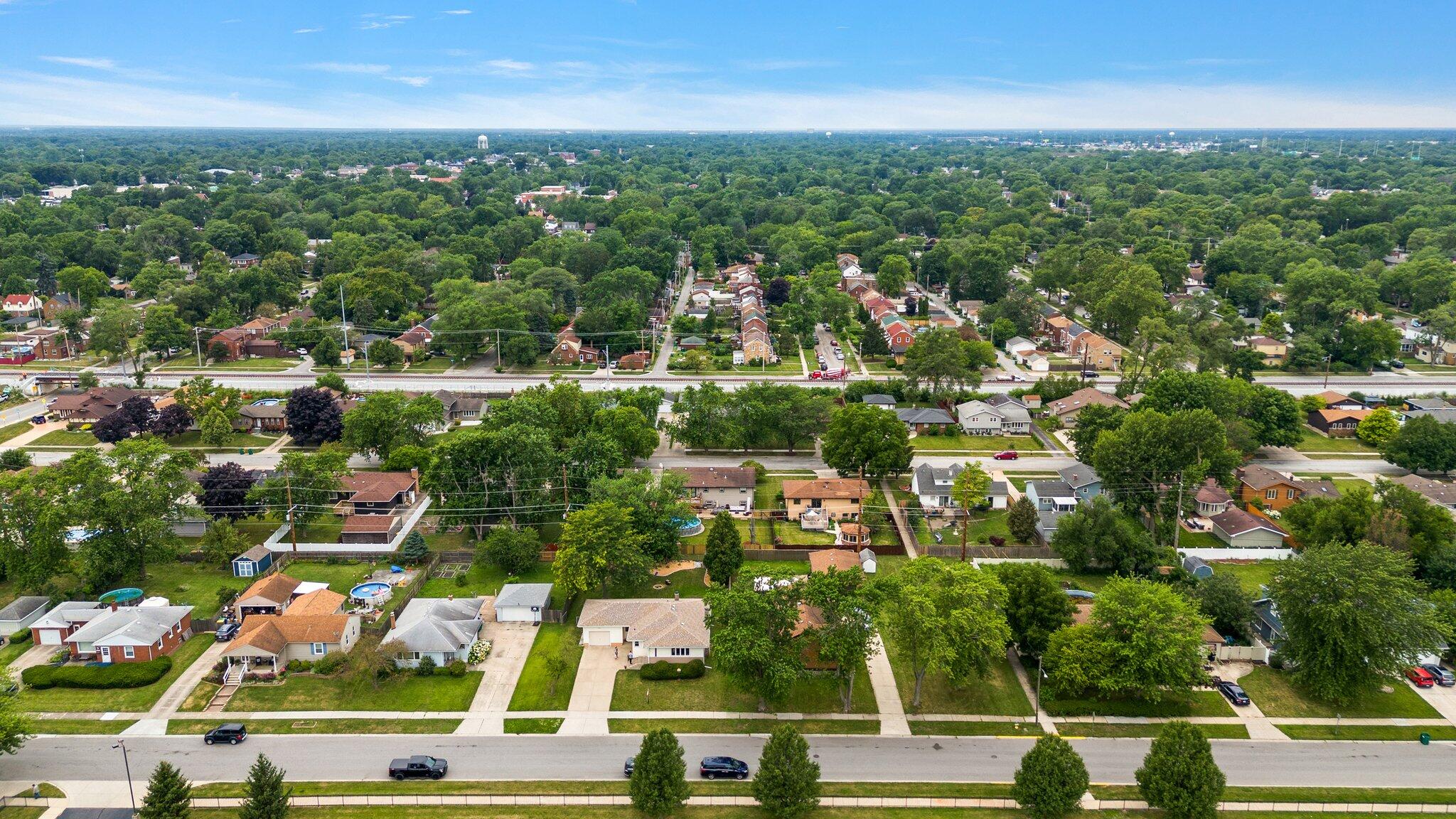 8014 Harrison Avenue Munster, IN 46321 - Photo 37 of 37 an aerial view of residential houses with outdoor space and trees
