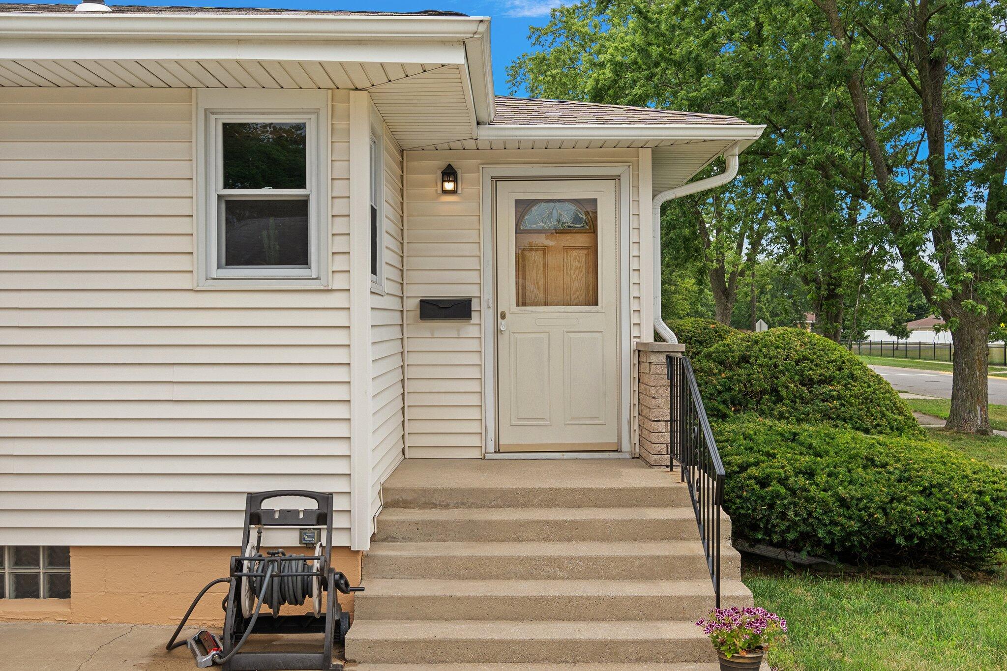 8014 Harrison Avenue Munster, IN 46321 - Photo 5 of 37 a view of a entryway door front of house