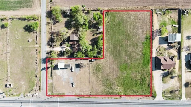 a bathroom with a shower and a mirror