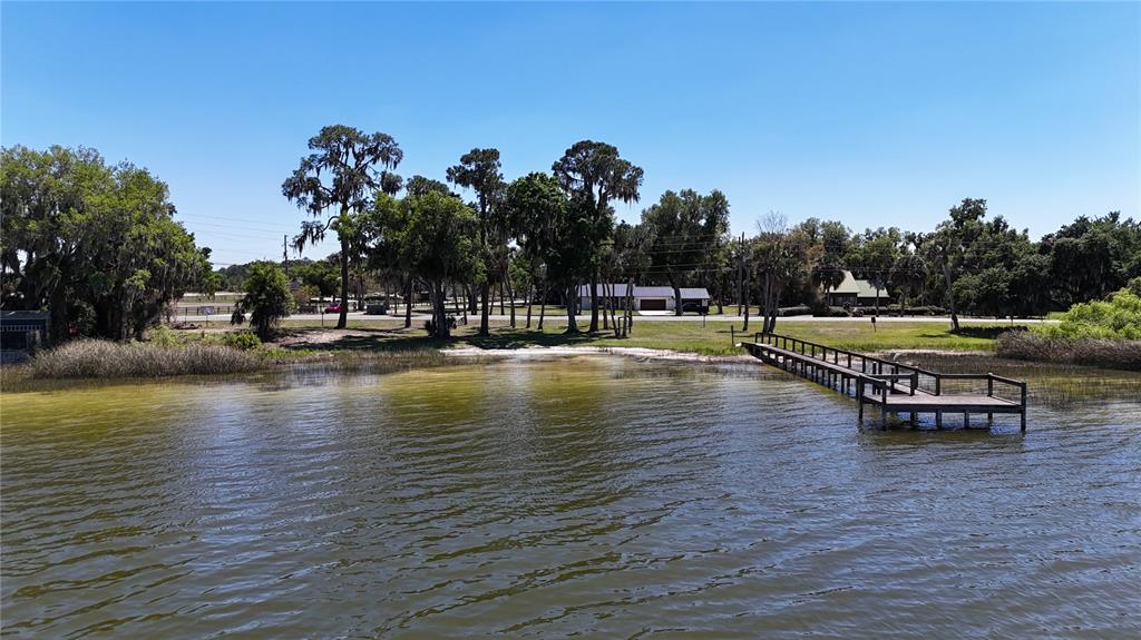 58 Deer Road Frostproof, FL 33843 - Photo 2 of 20 a view of a lake with houses