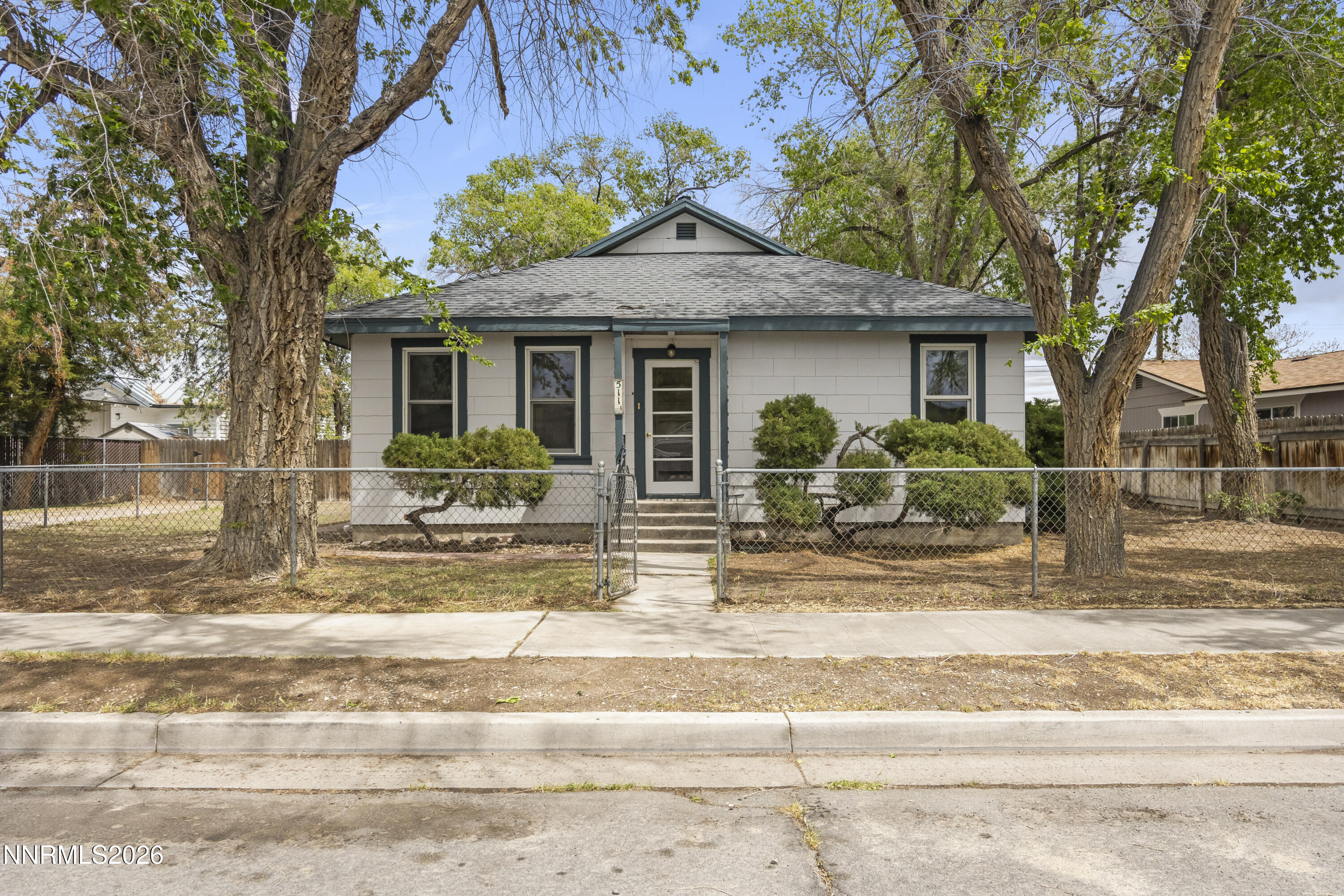 511 Churchill Street Fallon, NV 89406 - Photo 1 of 37 a view of a house with a yard