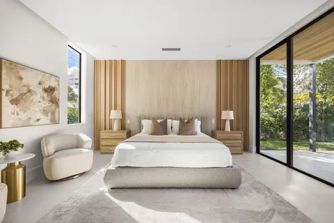 a view of a hallway with windows