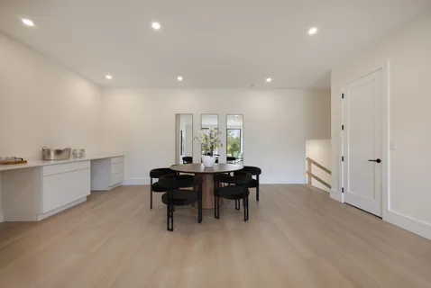 a kitchen with a sink and refrigerator