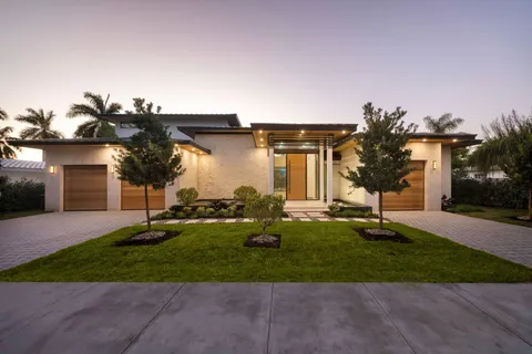 a view of a house with a swimming pool