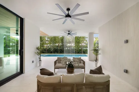 a view of house with yard and entertaining space