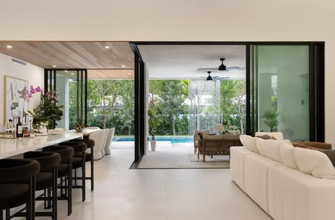 a room with furniture and a large window