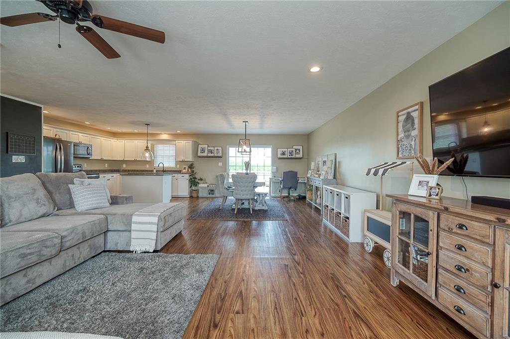 667 Ridge Road Georgetown, PA 15043 - Photo 11 of 27 a living room with furniture and a wooden floor