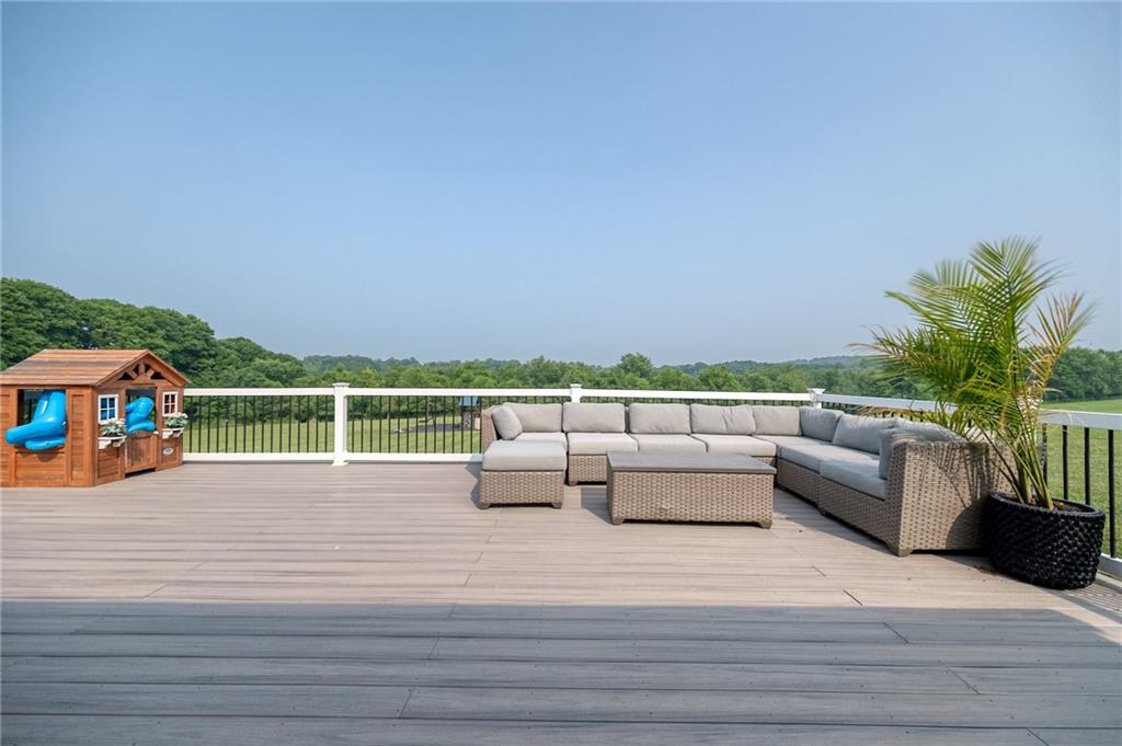 667 Ridge Road Georgetown, PA 15043 - Photo 12 of 27 a view of a terrace with chairs